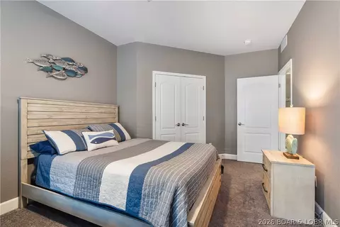 Bedroom - 100 Trinity Pointe Dr #3S, Camdenton, MO 65020 photo 6 of 8