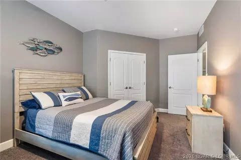 Bedroom - 100 Trinity Pointe Dr #3S, Camdenton, MO 65020 photo 6 of 8