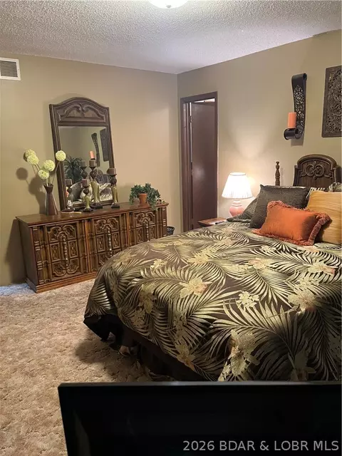 Bedroom - 930 Cedar Ridge Cir, Roach, MO 65787 photo 2 of 7
