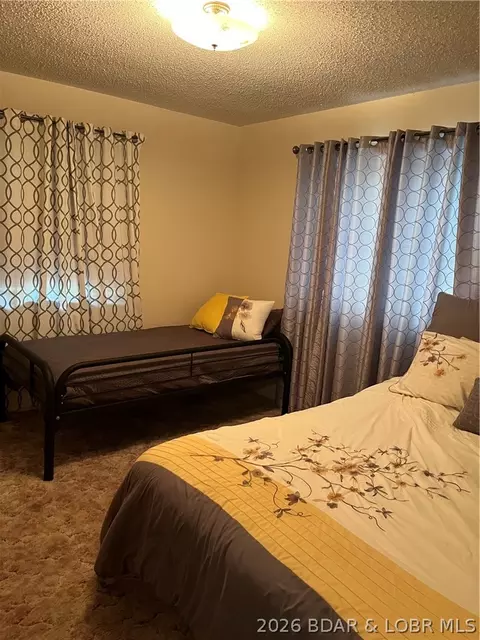 Bedroom - 930 Cedar Ridge Cir, Roach, MO 65787 photo 6 of 7