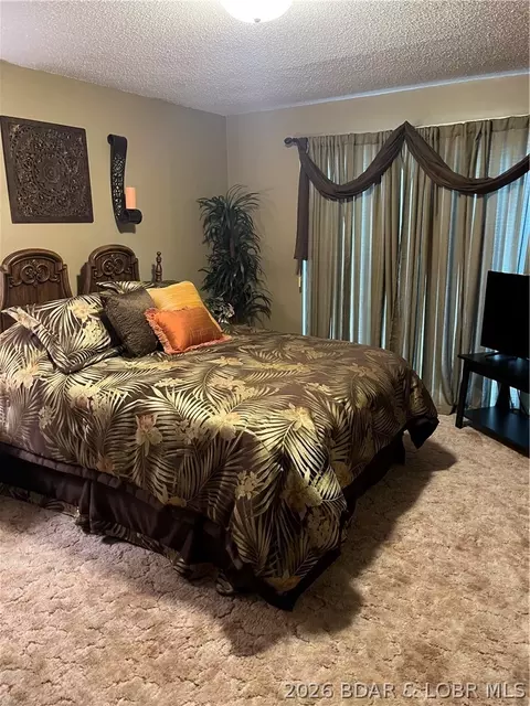 Bedroom - 930 Cedar Ridge Cir, Roach, MO 65787 photo 1 of 7