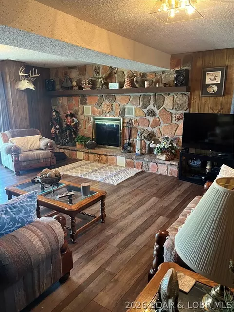 Living - 930 Cedar Ridge Cir, Roach, MO 65787 photo 1 of 2