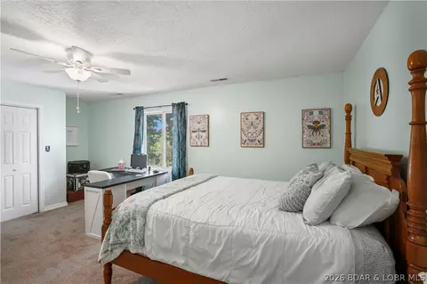 Bedroom - 14511 Highway E, Eldridge, MO 65463 photo 10 of 10
