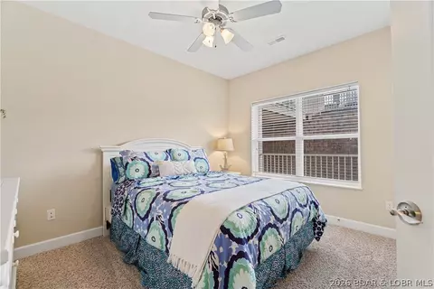 Bedroom - 100 Trinity Pointe Dr #3N, Camdenton, MO 65020 photo 4 of 7
