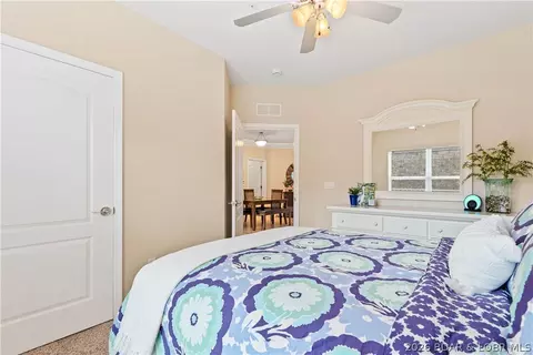 Bedroom - 100 Trinity Pointe Dr #3N, Camdenton, MO 65020 photo 5 of 7