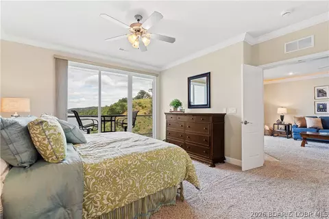 Bedroom - 100 Trinity Pointe Dr #3N, Camdenton, MO 65020 photo 3 of 7