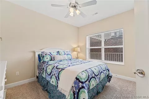 Bedroom - 100 Trinity Pointe Dr #3N, Camdenton, MO 65020 photo 4 of 7
