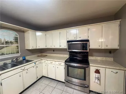 Kitchen - 19388 Hwy 5 Hwy, Versailles, MO 65084 photo 2 of 3