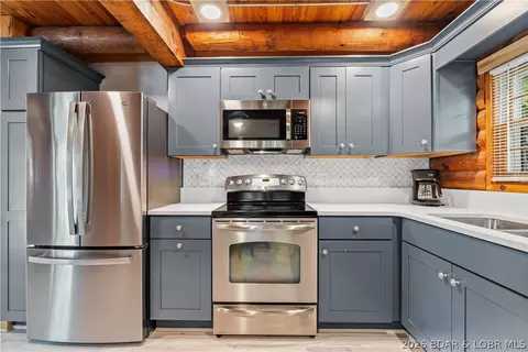 Kitchen - 1030 Pleasant Valley Dr, Roach, MO 65787 photo 2 of 2