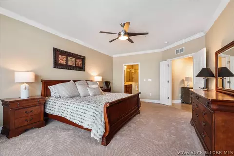 Bedroom - 100 Trinity Pointe Dr #2J, Camdenton, MO 65020 photo 6 of 8