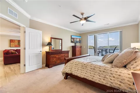 Bedroom - 100 Trinity Pointe Dr #2J, Camdenton, MO 65020 photo 7 of 8