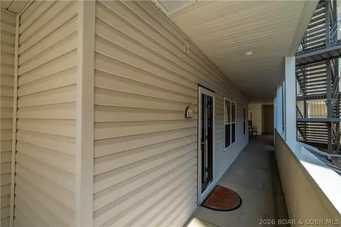 Exterior - 100 Trinity Pointe Dr #2J, Camdenton, MO 65020 photo 8 of 17