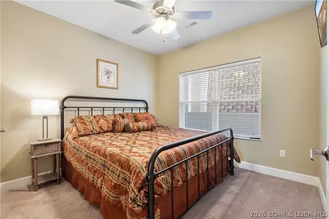 Bedroom - 100 Trinity Pointe Dr #2J, Camdenton, MO 65020 photo 2 of 8