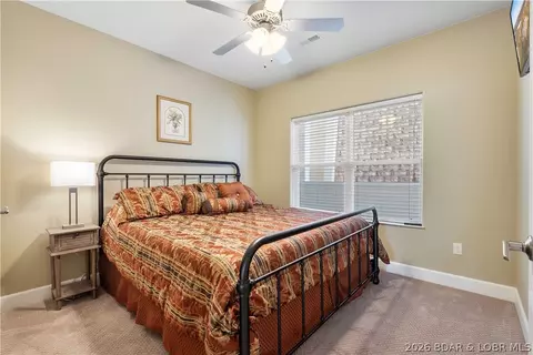 Bedroom - 100 Trinity Pointe Dr #2J, Camdenton, MO 65020 photo 2 of 8