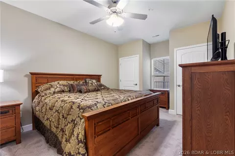 Bedroom - 100 Trinity Pointe Dr #2J, Camdenton, MO 65020 photo 4 of 8