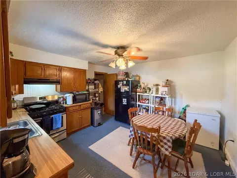 Kitchen - 407 S Oak St, Versailles, MO 65084 photo 2 of 3