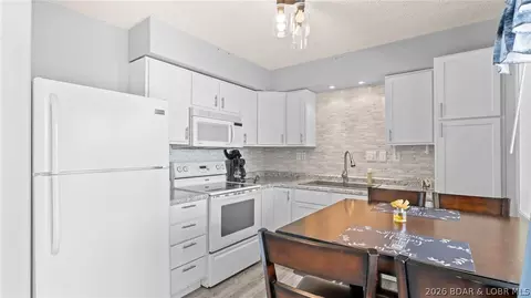 Kitchen - 412 Bowers Dr #C, Camdenton, MO 65020 photo 3 of 3