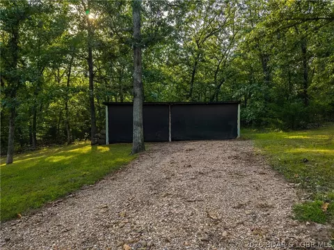 Exterior - 4864 Whispering Timbers Rd, Stover, MO 65078 photo 5 of 38
