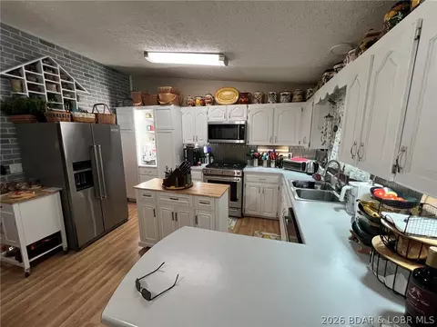 Kitchen - 210 Jim St, Eldon, MO 65026 photo 2 of 2