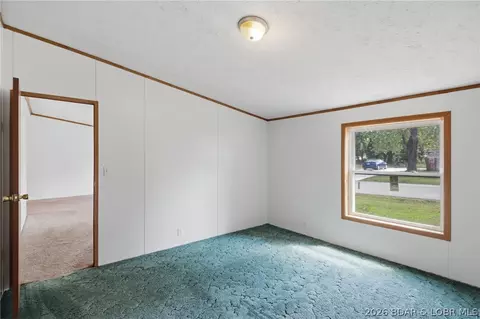 Bedroom - 405 8th St, Eldon, MO 65026 photo 11 of 11
