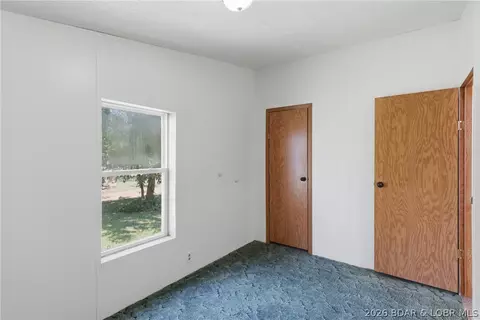 Bedroom - 405 8th St, Eldon, MO 65026 photo 7 of 11