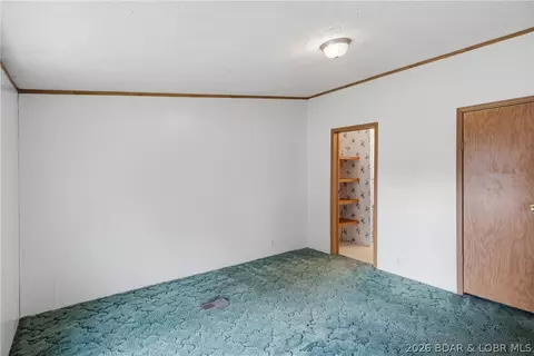 Bedroom - 405 8th St, Eldon, MO 65026 photo 9 of 11