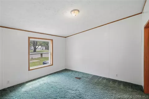 Bedroom - 405 8th St, Eldon, MO 65026 photo 8 of 11