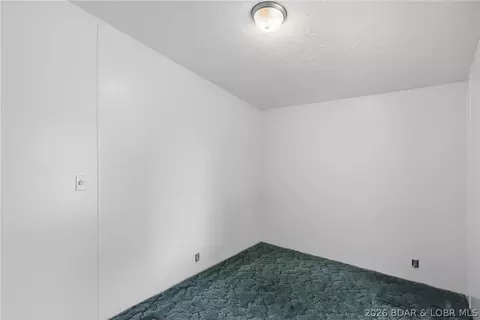 Bedroom - 405 8th St, Eldon, MO 65026 photo 5 of 11