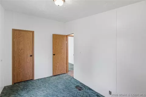 Bedroom - 405 8th St, Eldon, MO 65026 photo 6 of 11