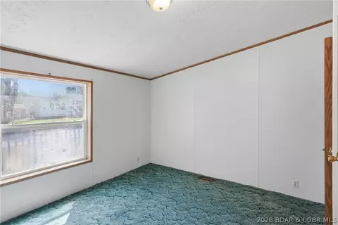 Bedroom - 405 8th St, Eldon, MO 65026 photo 3 of 11