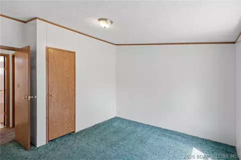 Bedroom - 405 8th St, Eldon, MO 65026 photo 1 of 11