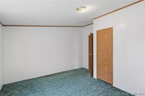Bedroom - 405 8th St, Eldon, MO 65026 photo 2 of 11