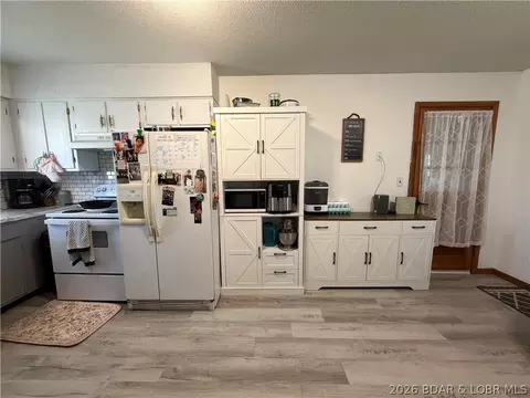 Kitchen - 1102 Clay St, Versailles, MO 65084 photo 2 of 2