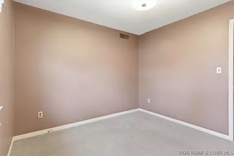Bedroom - 1007 Lawson Ave, Eldon, MO 65026 photo 2 of 11