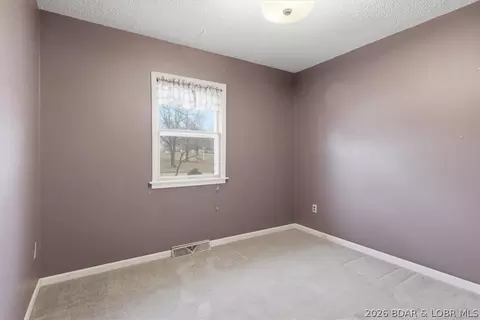 Bedroom - 1007 Lawson Ave, Eldon, MO 65026 photo 1 of 11