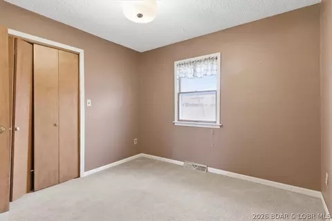 Bedroom - 1007 Lawson Ave, Eldon, MO 65026 photo 4 of 11