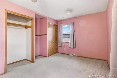 Bedroom - 1007 Lawson Ave, Eldon, MO 65026 photo 9 of 11