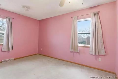 Bedroom - 1007 Lawson Ave, Eldon, MO 65026 photo 8 of 11
