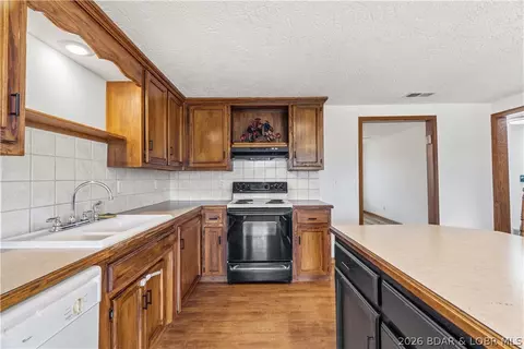 Kitchen - 7450 State Hwy 7, Roach, MO 65787 photo 4 of 7