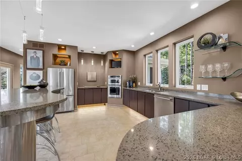 Kitchen - 314 W Wind Ln, Camdenton, MO 65020 photo 2 of 4