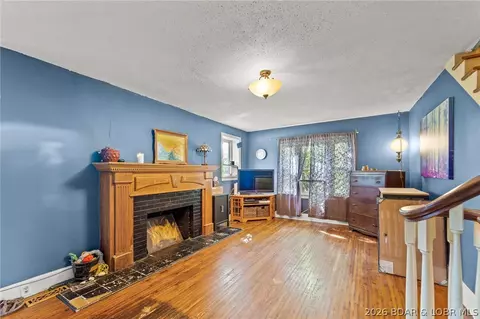 Living - 1418 S Summit Dr, Holts Summit, MO 65043 photo 1 of 1