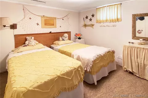 Bedroom - 34 Rays Rd, Sunrise Beach, MO 65079 photo 2 of 3