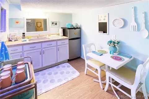 Kitchen - 34 Rays Rd, Sunrise Beach, MO 65079 photo 2 of 2