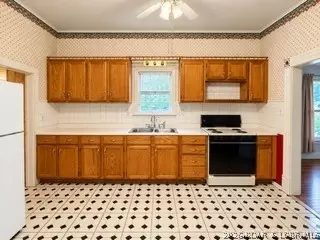 Kitchen - 610 Old W Rd, Versailles, MO 65084 photo 1 of 2