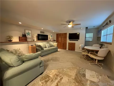Living - 30847 Rustic Rd, Rocky Mount, MO 65072 photo 2 of 3