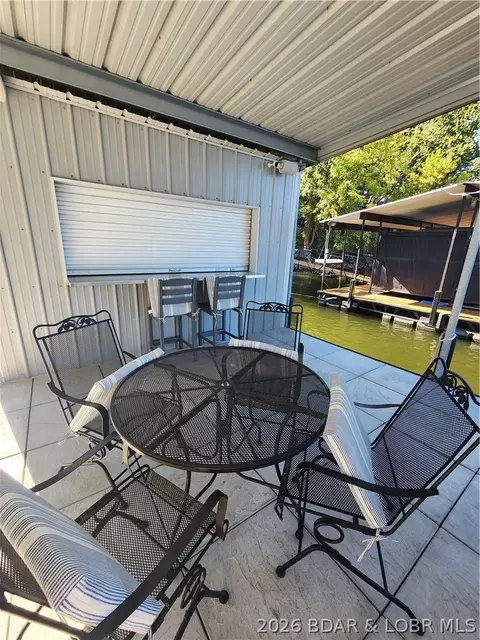 Exterior - 30847 Rustic Rd, Rocky Mount, MO 65072 photo 8 of 13