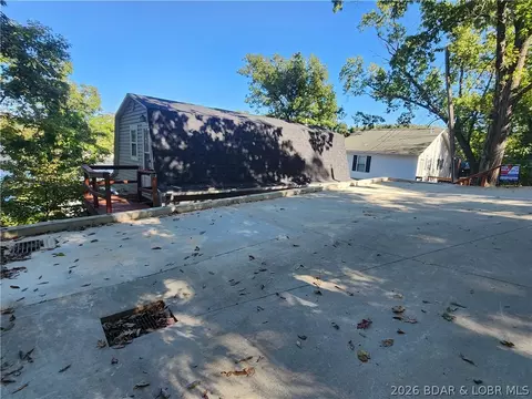 Exterior - 30847 Rustic Rd, Rocky Mount, MO 65072 photo 3 of 13