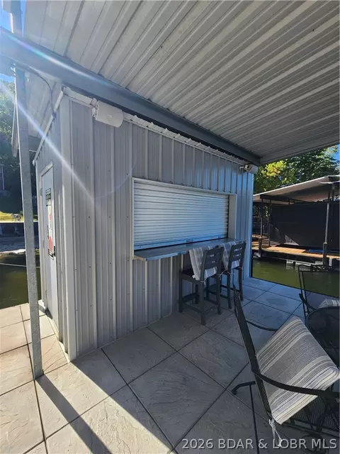 Exterior - 30847 Rustic Rd, Rocky Mount, MO 65072 photo 7 of 13