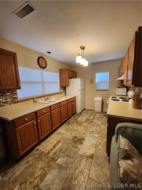 Kitchen - 30847 Rustic Rd, Rocky Mount, MO 65072 photo 1 of 3