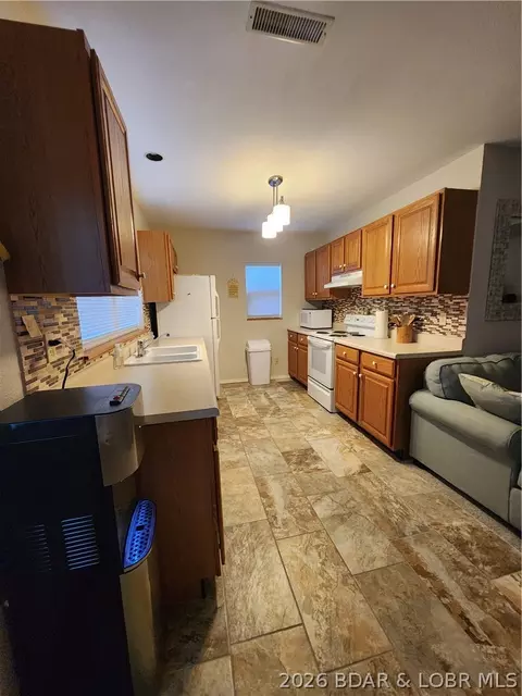 Kitchen - 30847 Rustic Rd, Rocky Mount, MO 65072 photo 3 of 3